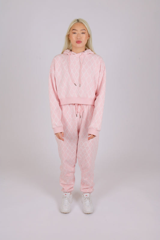 Monogram print relaxed joggers in pink